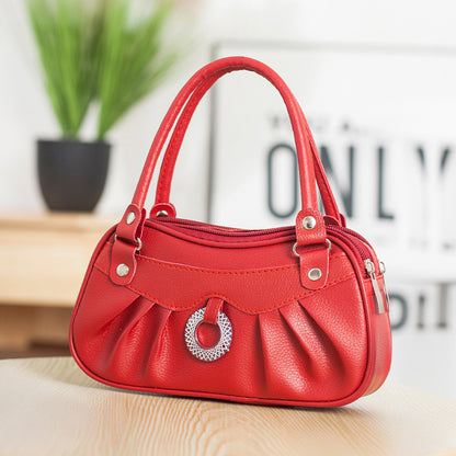 Μικρές τετράγωνες τσάντες κατάλληλες για μεσήλικες και ηλικιωμένες γυναίκες, όπως πορτοφόλια για κέρματα, θήκες για κλειδιά και θήκες για κινητά τηλέφωνα.